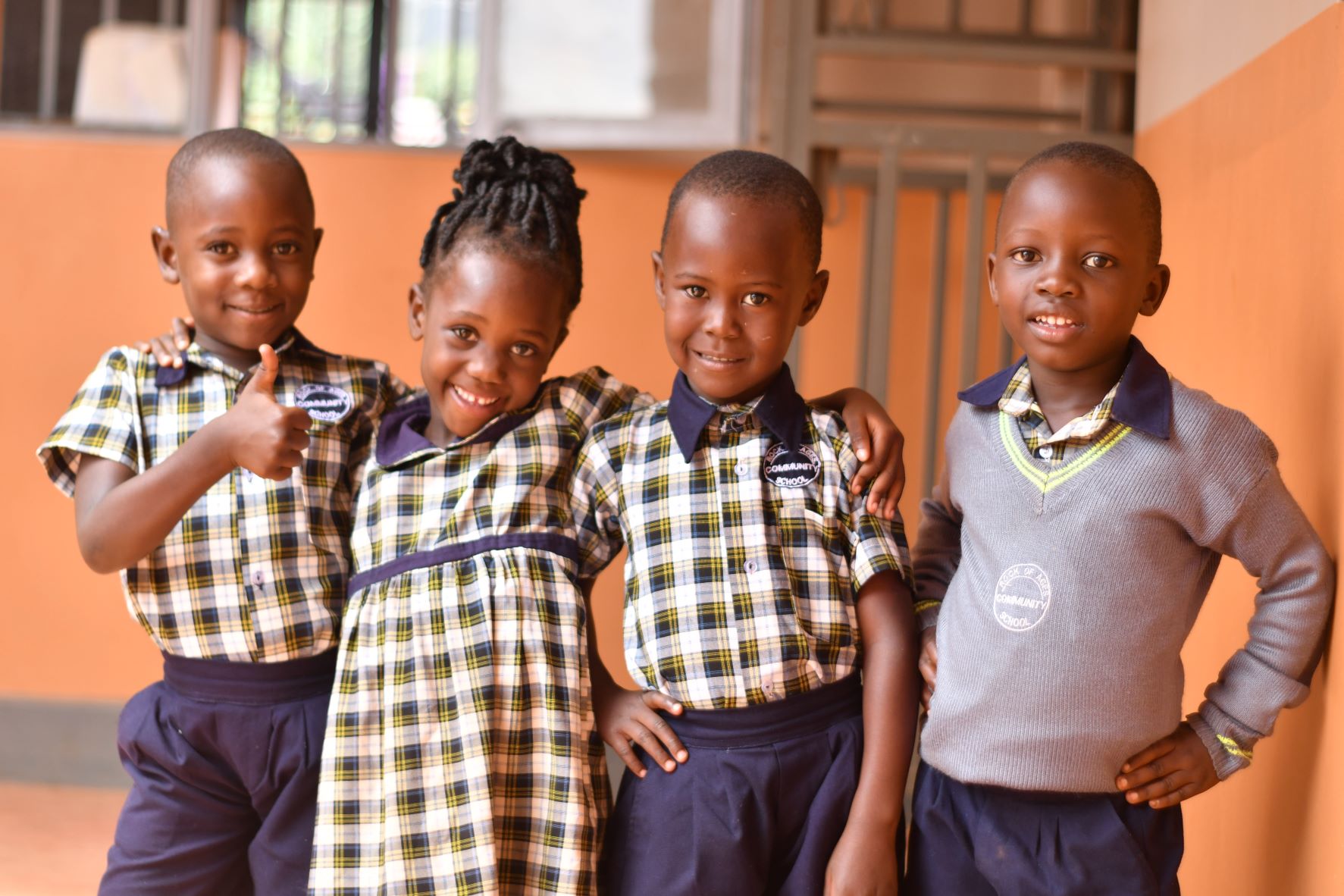 Ugandan students at the Rock of Ages Community School are back in school!